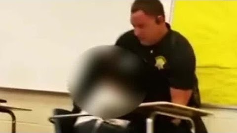 Officer on leave after video shows him drag a student