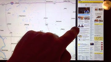 Windows 8: side-by-side apps on a touchscreen tablet