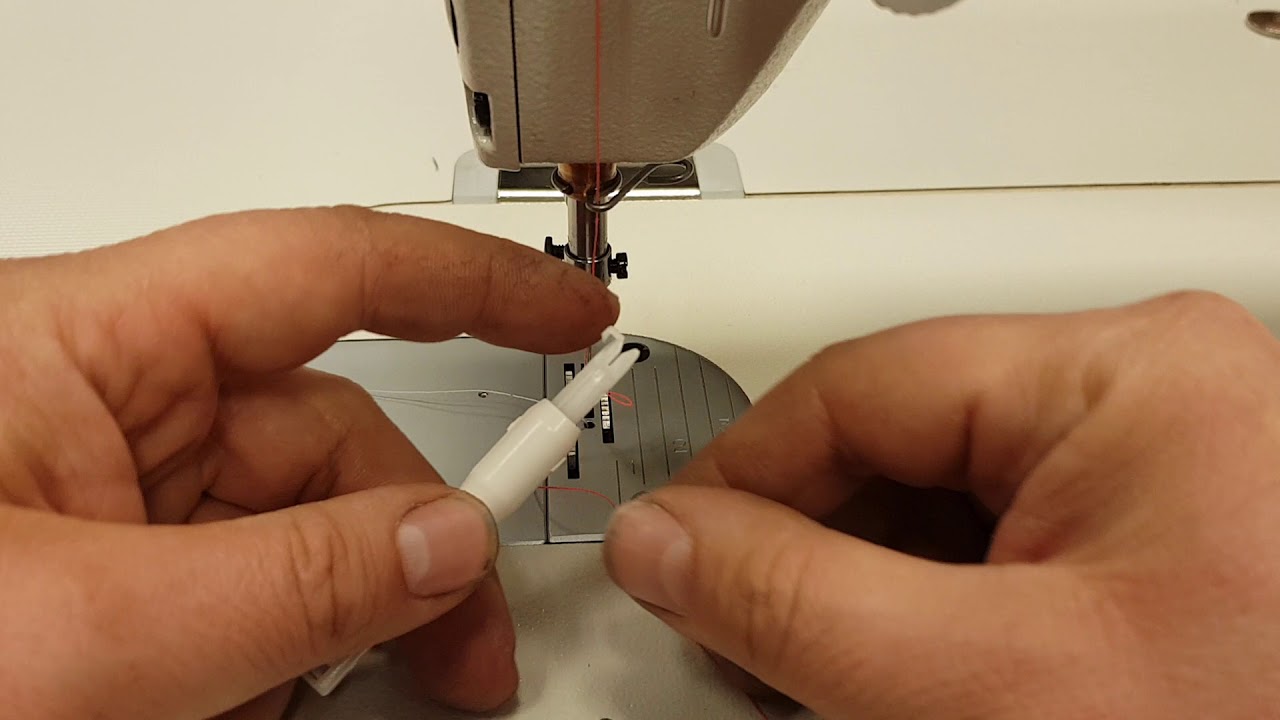 Nawlekacz igły Janome