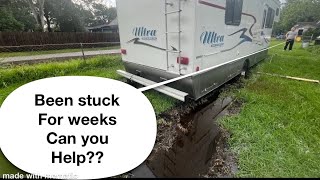 Rv been stuck for 2 weeks, can we get it out with a jeep??