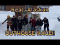 Alaskan's Race in Outhouses