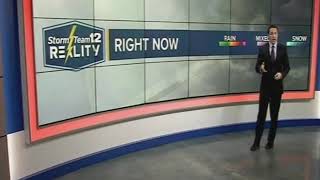 Millie the Weather Dog Walks thru Live Weather Display