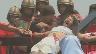 Good Friday crucifixion rituals: Philippine devotees nail hands and feet to wooden crosses