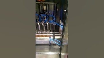 Automatic honey 4 nozzles glass bottle jar filling machine filler line