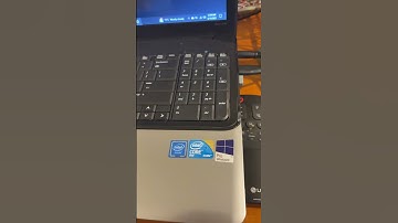 Windows 10 updates on a 2008 Compaq Presario CQ61 alongside Windows 11 23H2