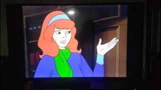 shadow creature unmasked Scooby Doo and scrappy Doo.