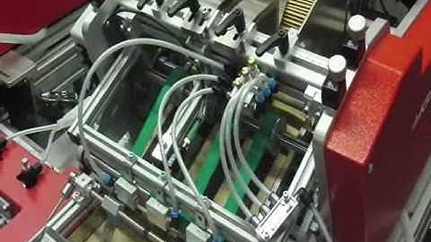 Espac Limited | Friction Feeder - Pusher Infeed - Automatic Shrink Wrapper