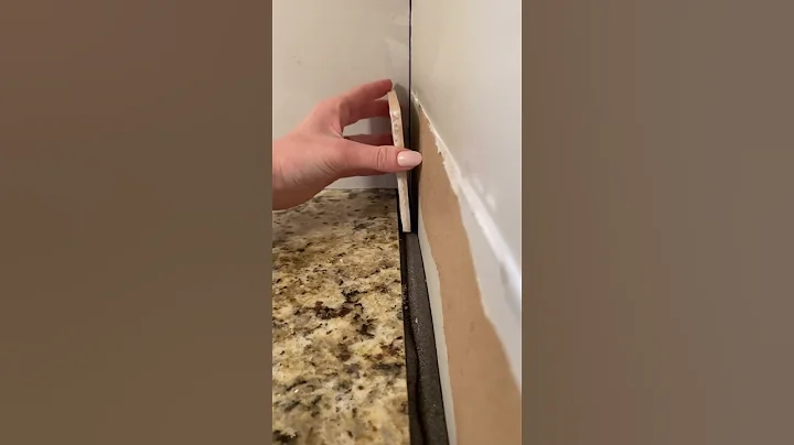 Removing our existing backsplash to replace it with new tile! #diy #tile #kitchen