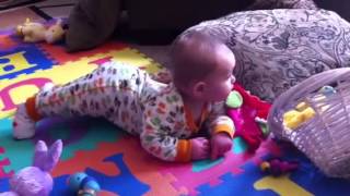 8 month old Addy's backward crawl