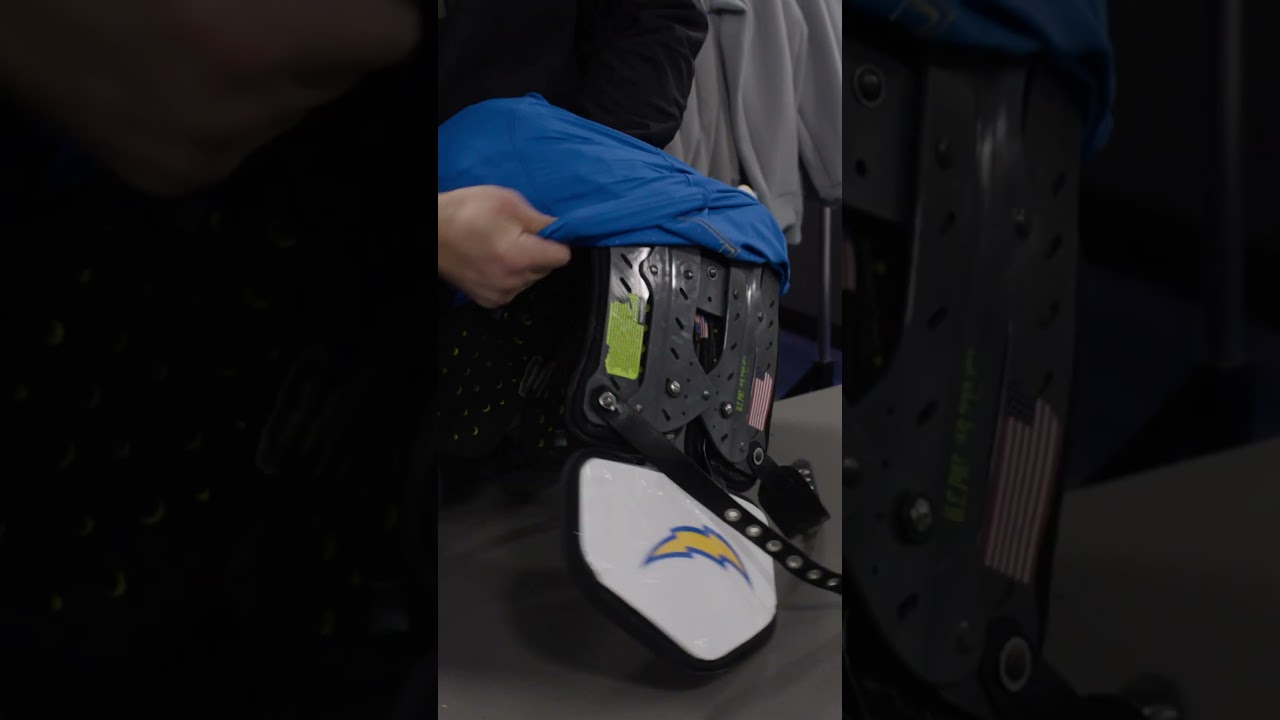 как надеть майку нфл на щитки