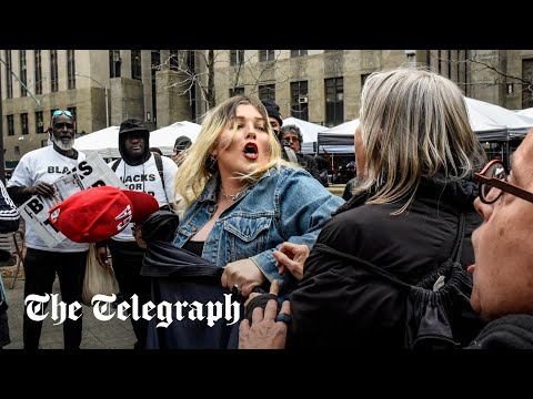 Trump supporter clashes with protesters outside court