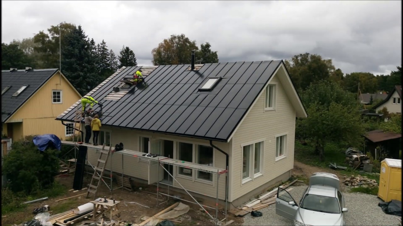 Installation of first metal solar roof in Estonia YouTube