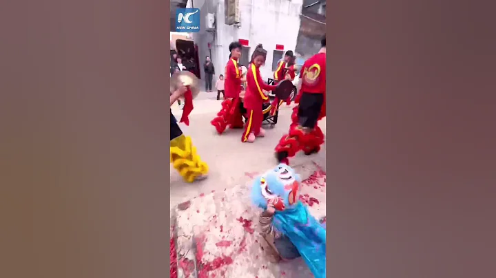 Salute from a 3-year-old lion dancer