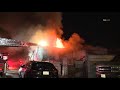 LAFD battle a commercial building fire in South Los Angeles, Ca.