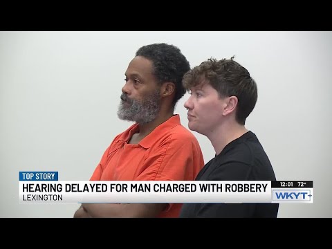 Hearing delayed for man charged in robbery