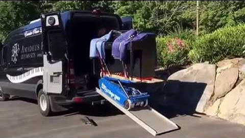 Thumbnail of One man piano moving with Piano Moving Robot