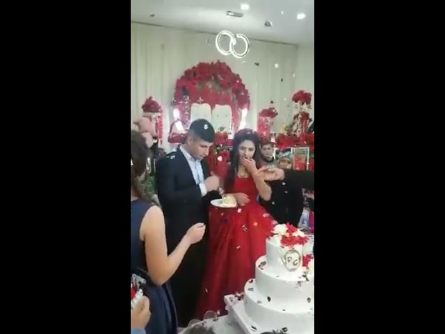 Angry groom loses it during wedding cake cutting ceremony, leaving guests and bride horrified class=