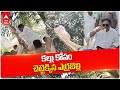 Minister Errabelli Dayakar Rao climbs palm tree for wine