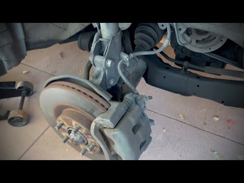 2007 Mazda CX-9 front brakes replacement easy and fast - YouTube