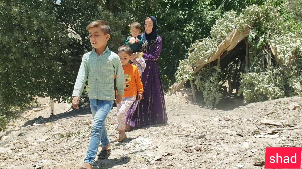 Nomad Life in Iran: A Mother's Traditional Way of Bathing her Children 🧒🛀
