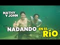 John valverde y nathaly snchez nadando juntos en el rio