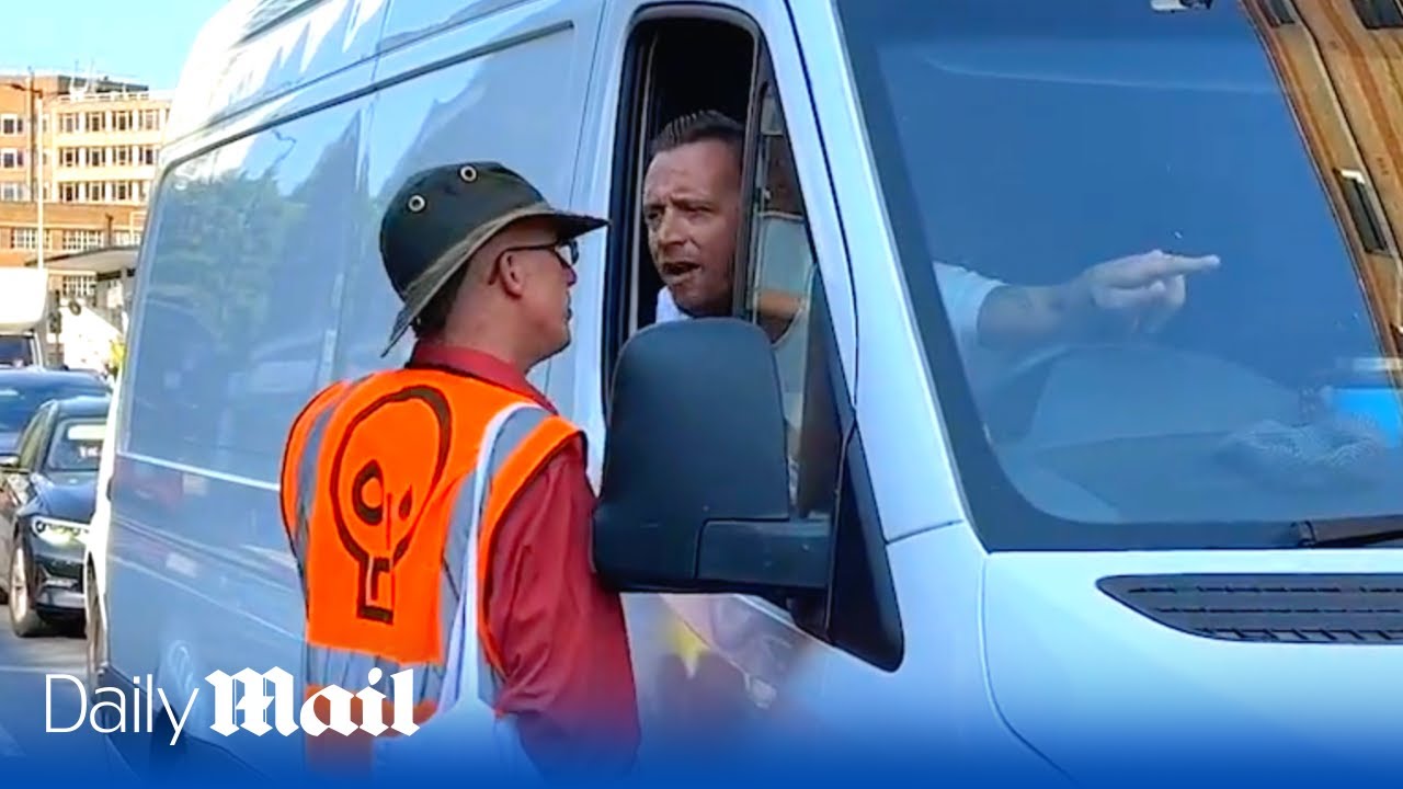 ‘Why are we the victims?’ Furious white van man confronts Just Stop Oil protesters in London