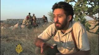 Rebels clash with Syrian army over suburbs