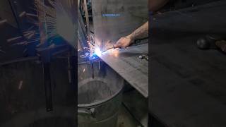 using bar clamps to close a gap before welding. welder welding migwelding metalwork metalfab