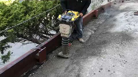 This video shows compacting with a “Jumping Jack” compactor, to meet the specification