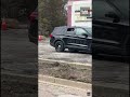 Handcuffed woman makes daring escape through open window of police vehicle