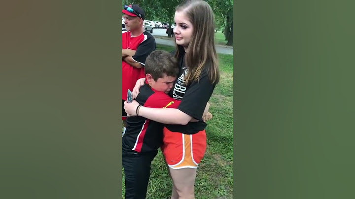Army sister surprises little brother at ballgame