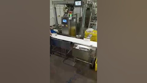 checkweigher with pusher rejection system