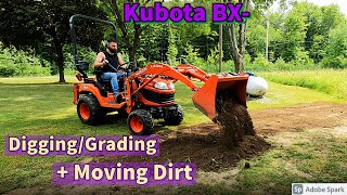 Kubota BX Moving dirt, Filling low spots, Grading + Digging a stump