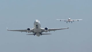 Star Alliance A340 Creeps Up Behind a WestJet 737