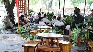 A cozy corner cafe where you can listen to the sounds of the street