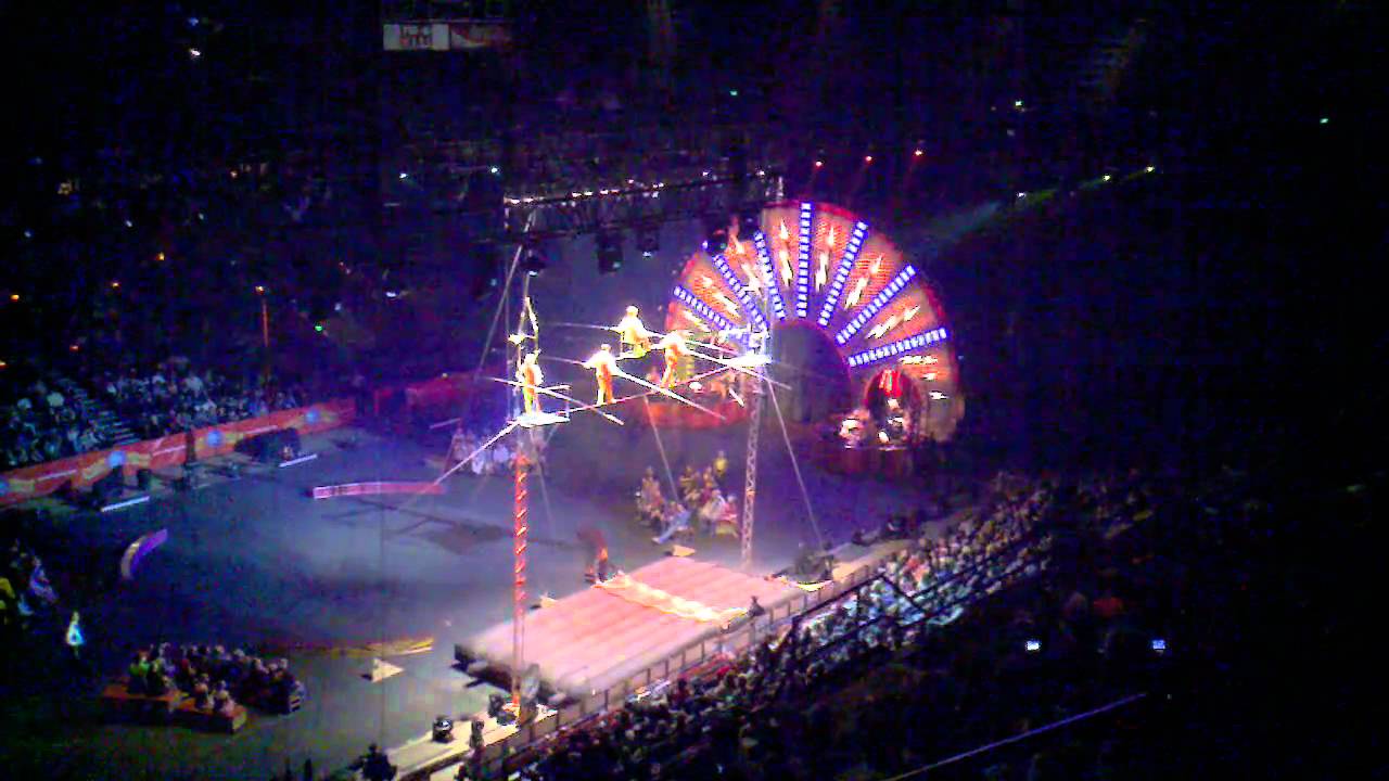 Three person balancing act on tight rope Ringling Brothers circus - YouTube