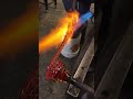 Glass artist Andrew Thompson and the MPLS Glass team create a coiled cane vase