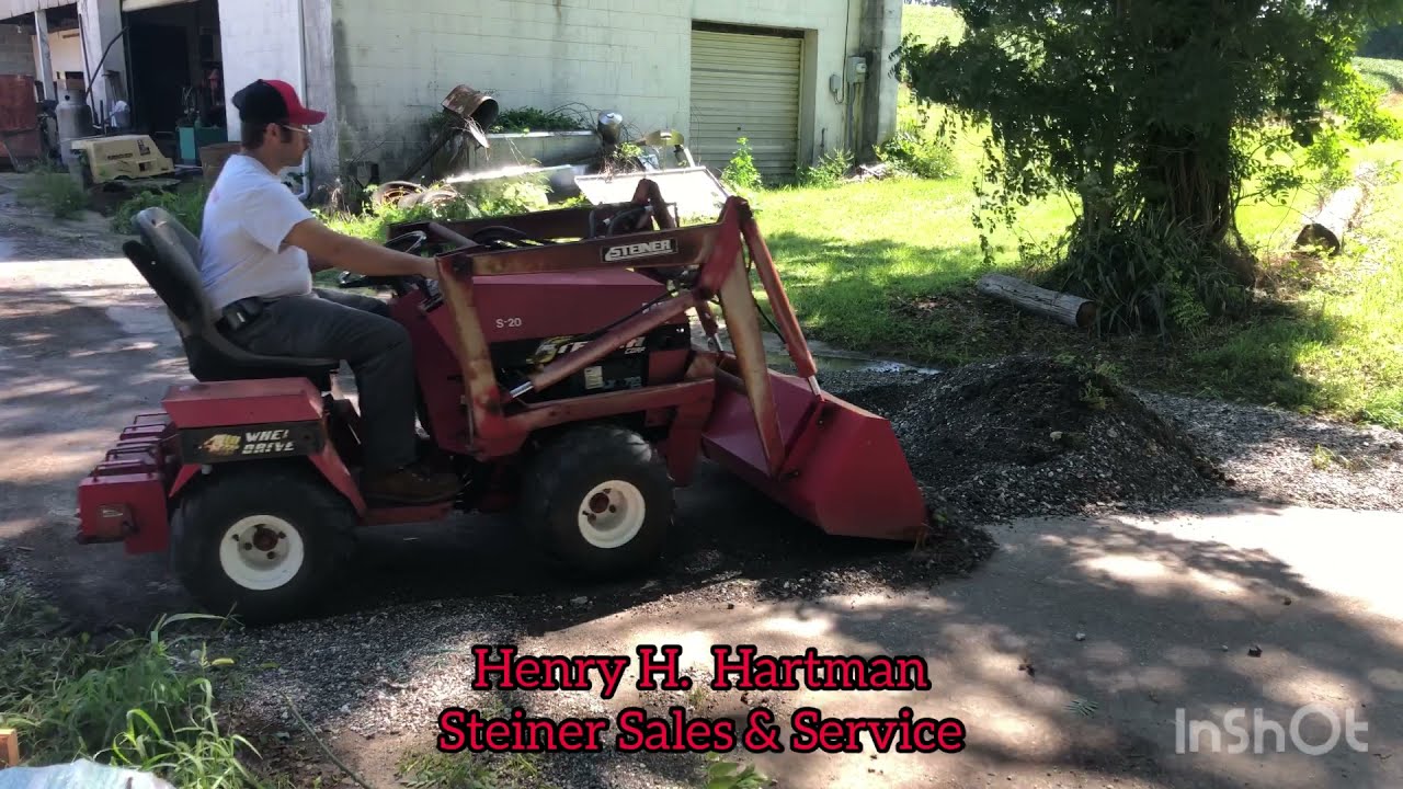 Old Steiner Loader cleaning up wet stones
