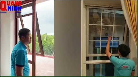 Cửa lưới chống muỗi tự cuốn dọc có bộ giảm tốc Quang Minh