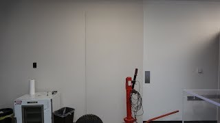 A Vintage Montgomery A-Series Hydraulic Elevator that is fully covered up.