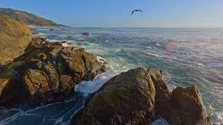 Cliffside view of Pacific Ocean Waves breaking on a Rocky Shoreline - Big Sur Coastline