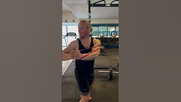 Standing trunk rotation with Powerband