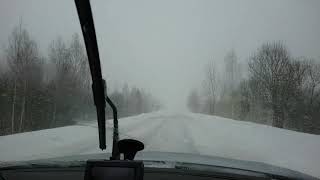 Blizzard on road.