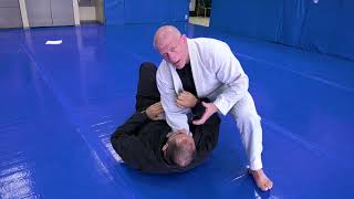 Hand in collar knee slice pass to cross collar choke