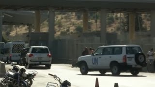 Raw: UN Cars Enter Syria, Aid Stuck At Border screenshot 4