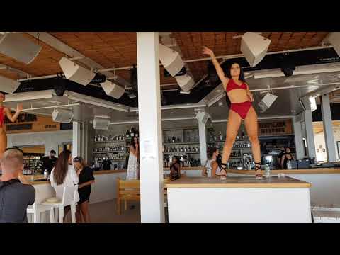 Gogo dancers in Mykonos Super Paradise Beach party