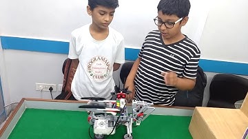 Young Kid Engineers demonstrating their self built Robot - MindCuber to solve the Rubik