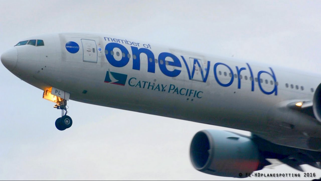 one world livery cathay pacific boeing 777 landing at heathrow cathay pacific frequent flyer sign up