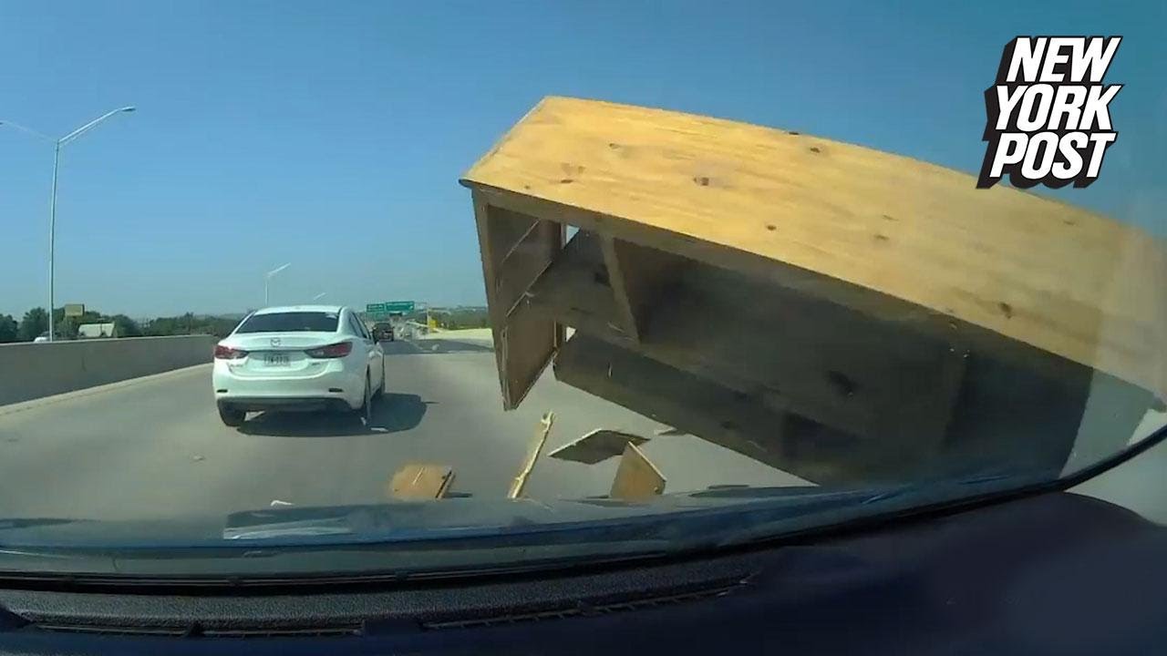 Furniture on the highway causes head on collision