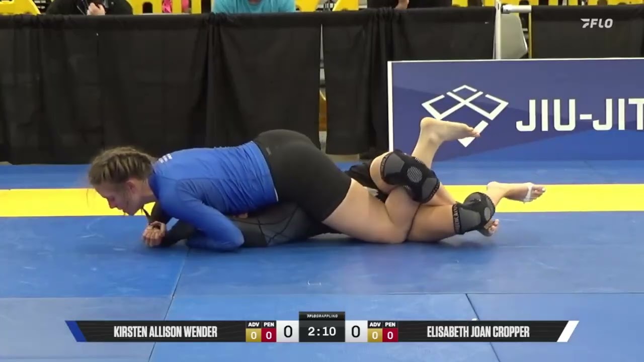 Kirsten Wender pinned on the floor